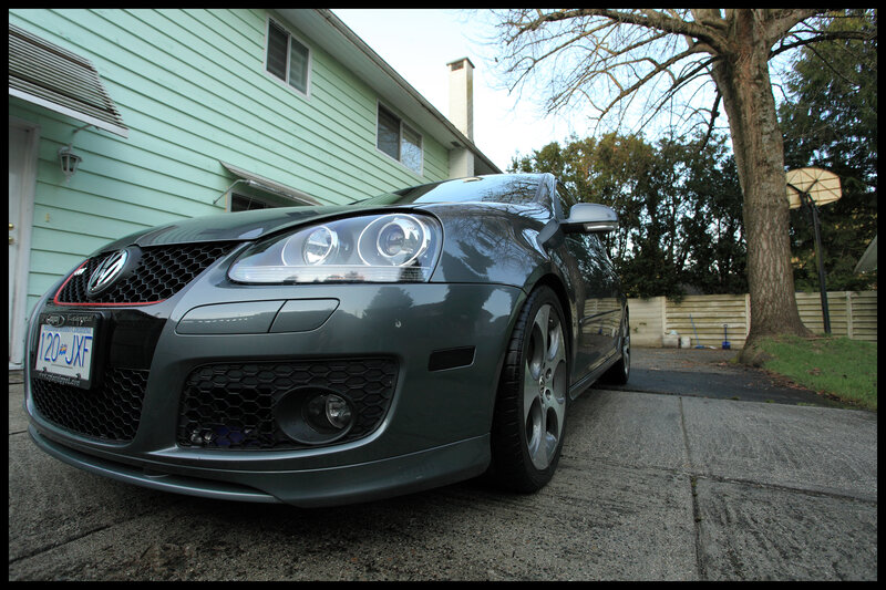 gray volkswagen in driveway