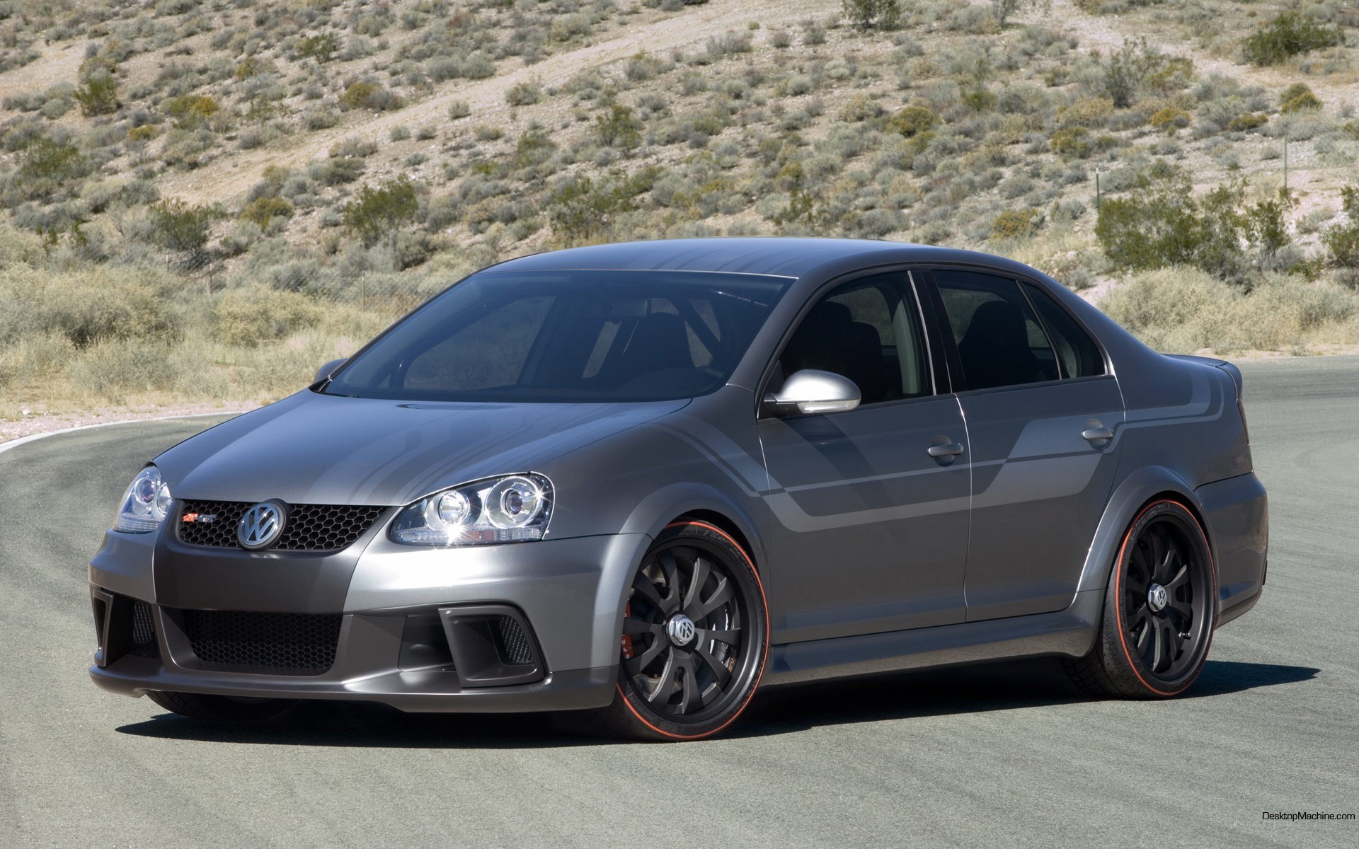 gray volkswagen jetta on track