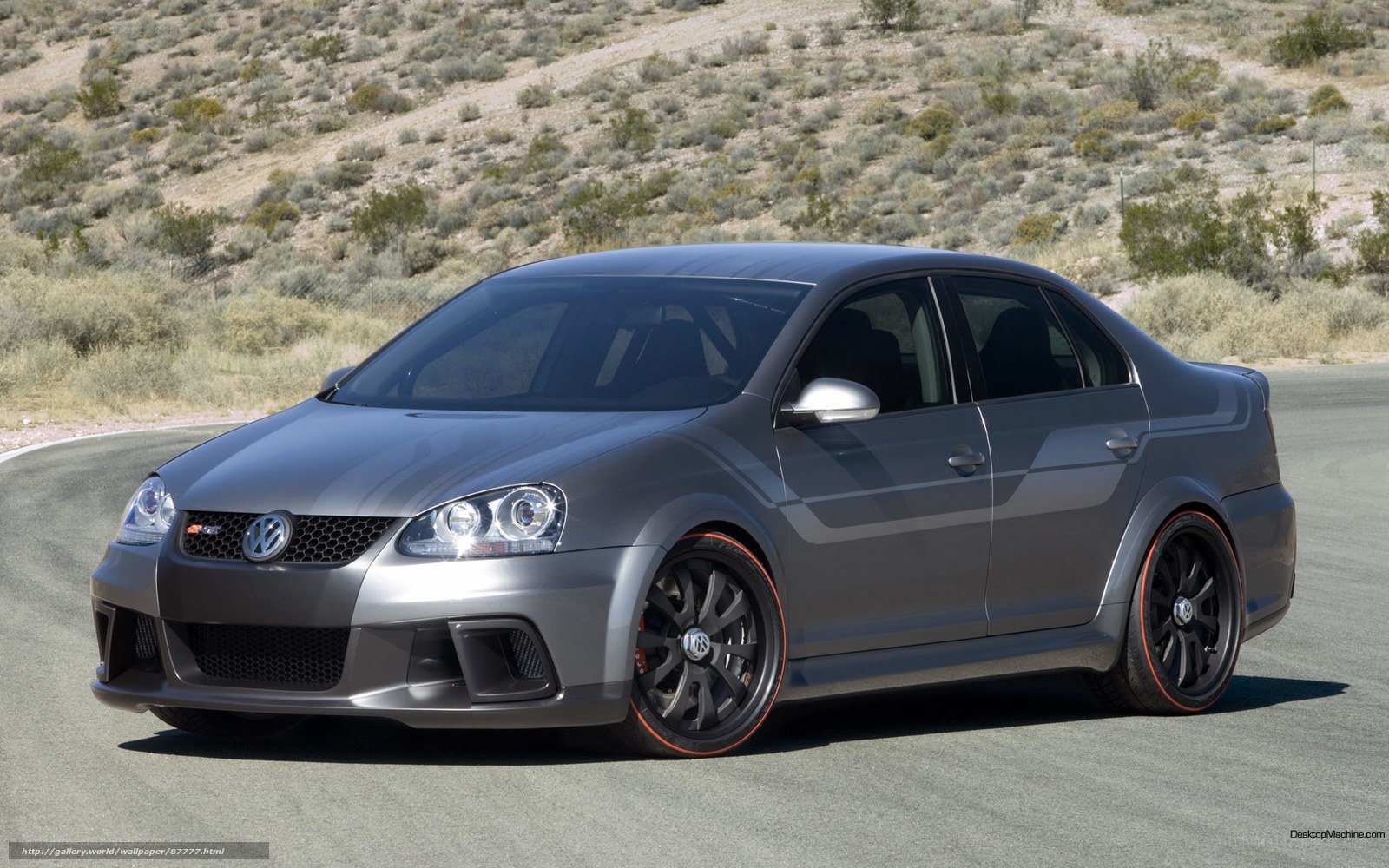 gray volkswagen jetta on track