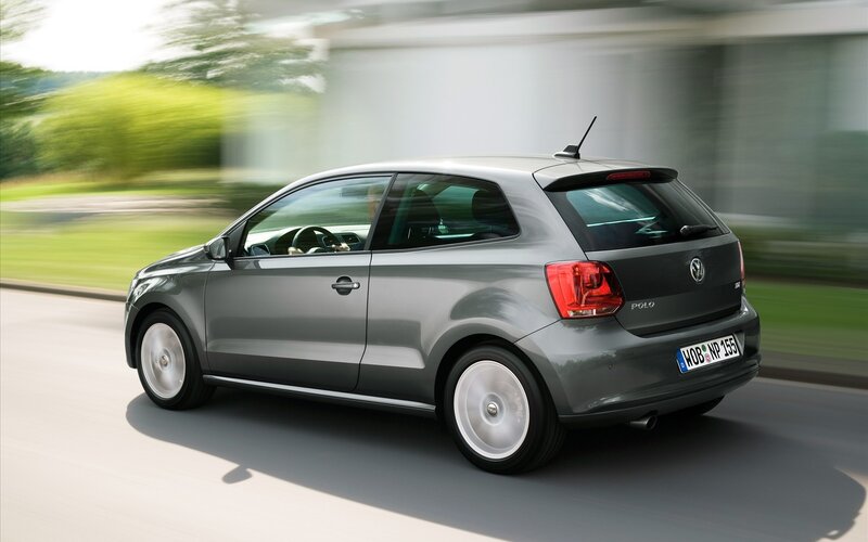 gray volkswagen polo in motion