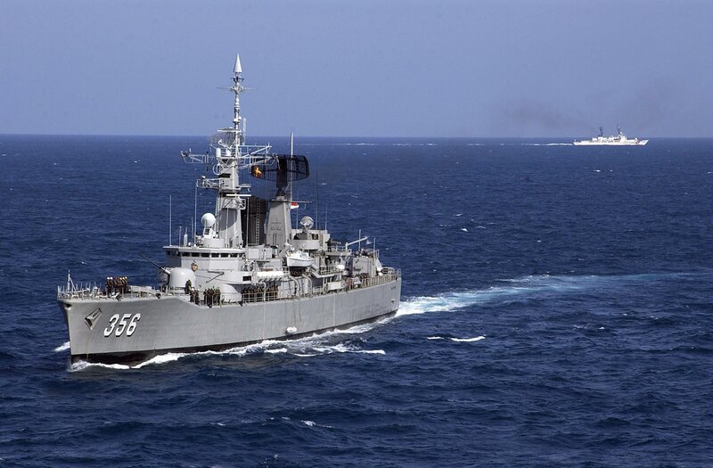 Gray Warship at Sea — Blue, Calm