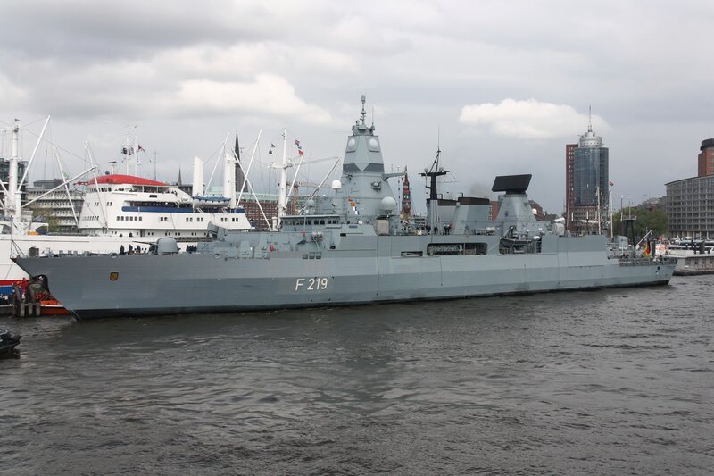 Gray Warship in Harbor — Overcast, Photograph