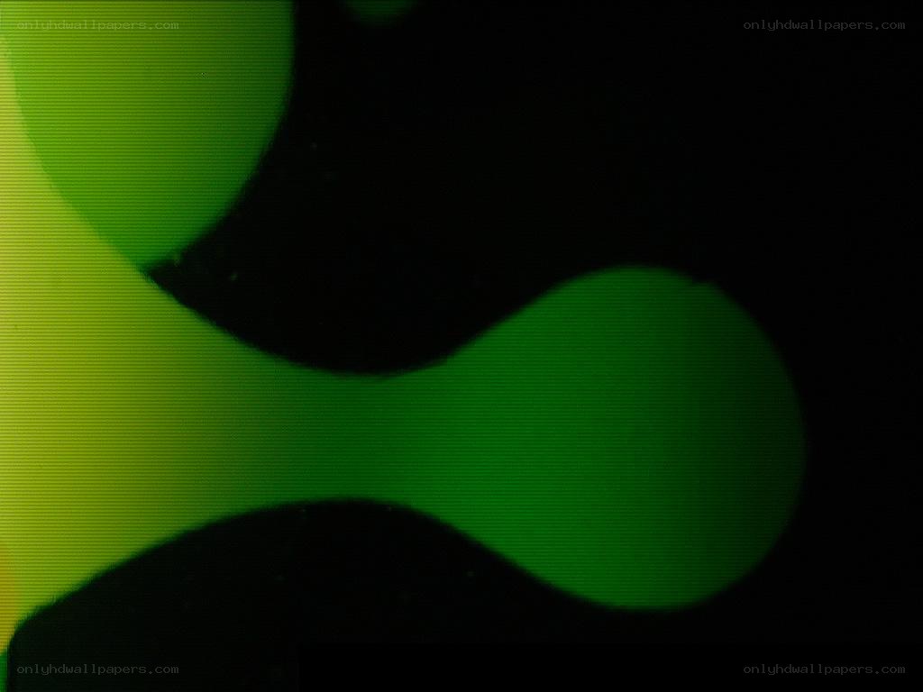 green abstract shapes on black