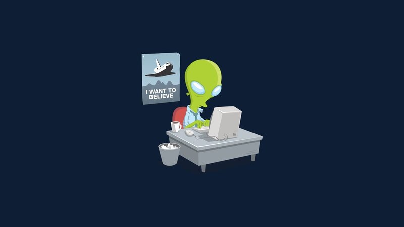 Green Alien at Desk