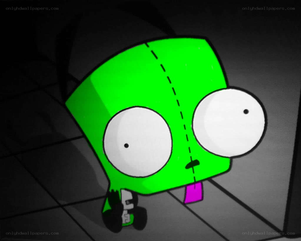 Green alien character in dark room