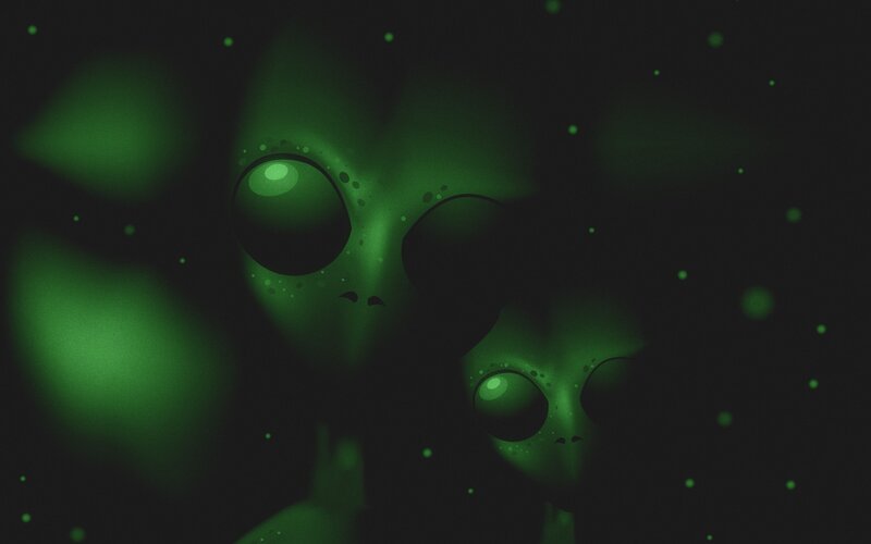 green alien faces in space