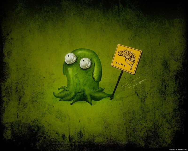 Green Alien Holding Sign