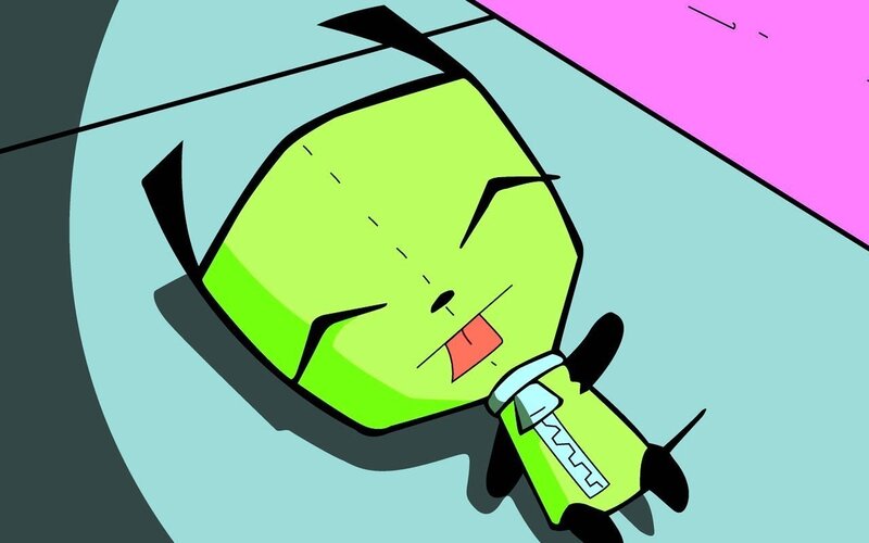 green alien lying down