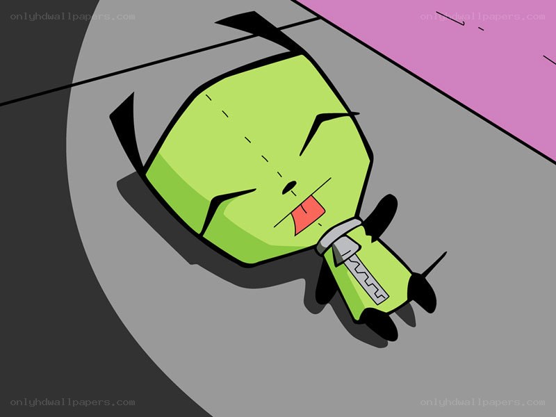 green alien lying on ground