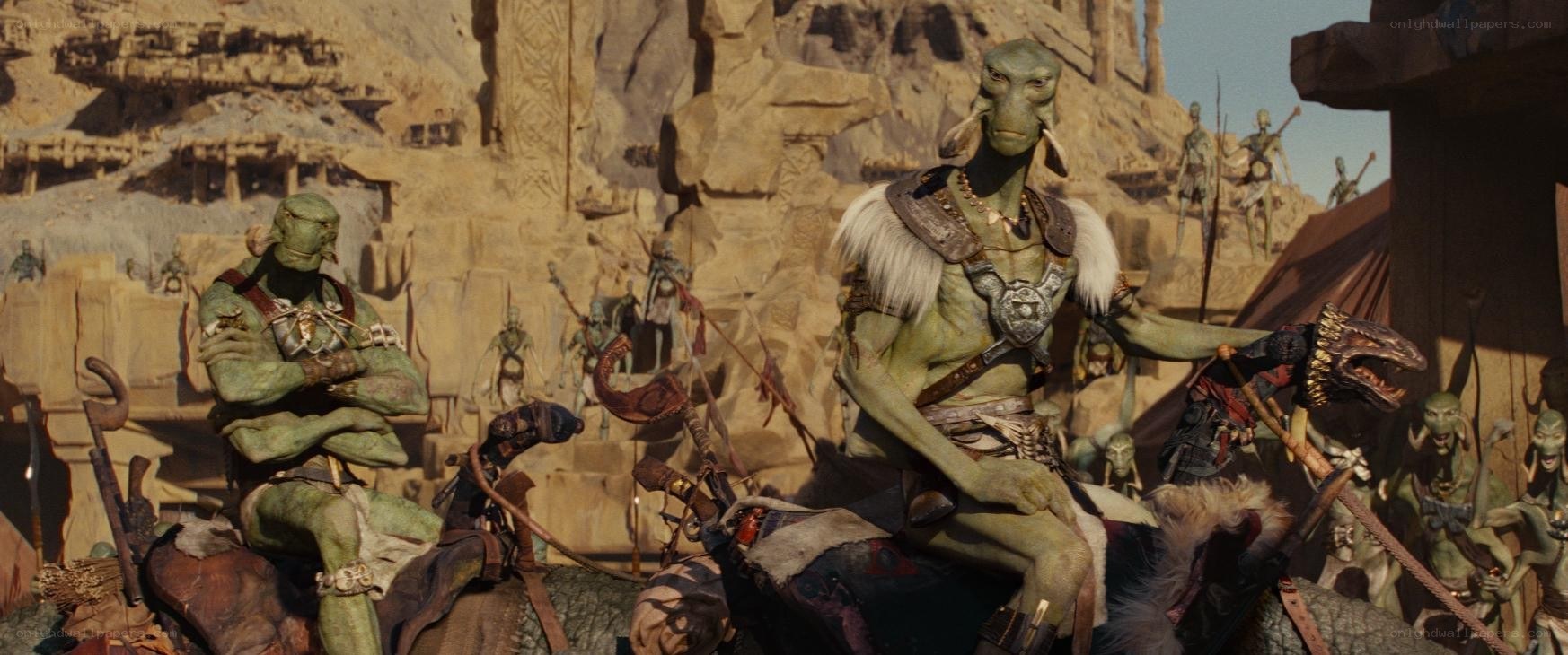 green alien warriors in desert