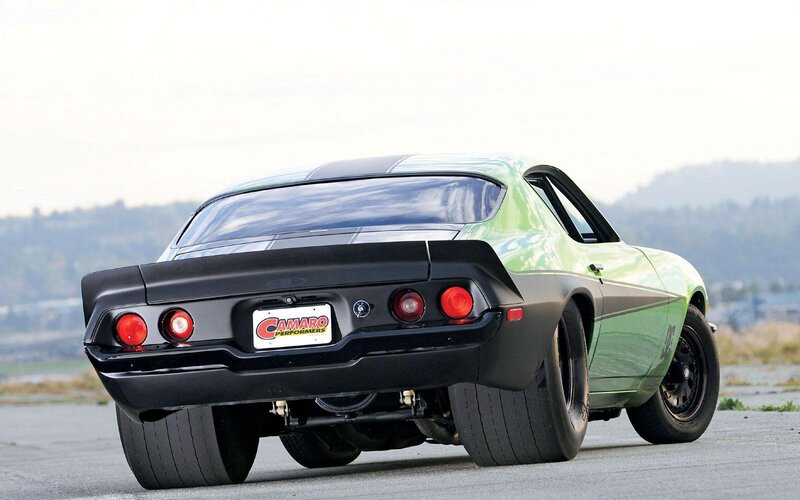 Green and black Camaro muscle car
