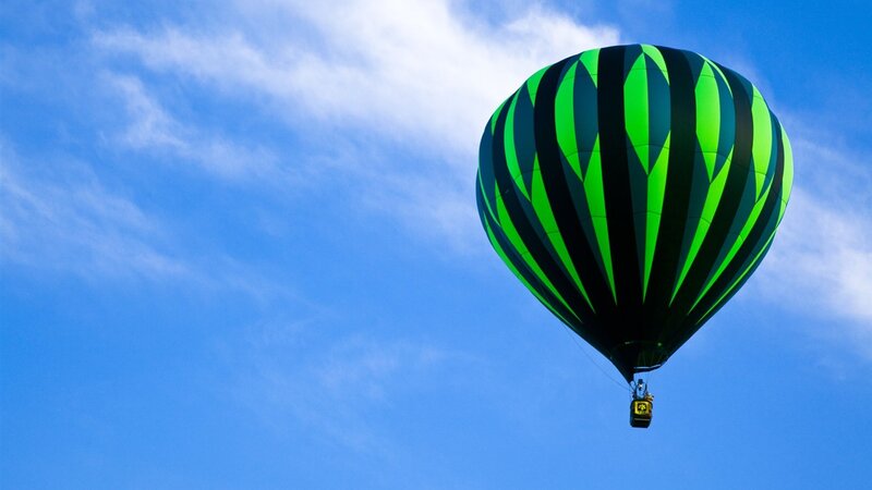 Green and Black Hot Air Balloon — Blue