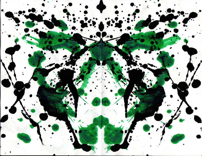 Green and black inkblot pattern