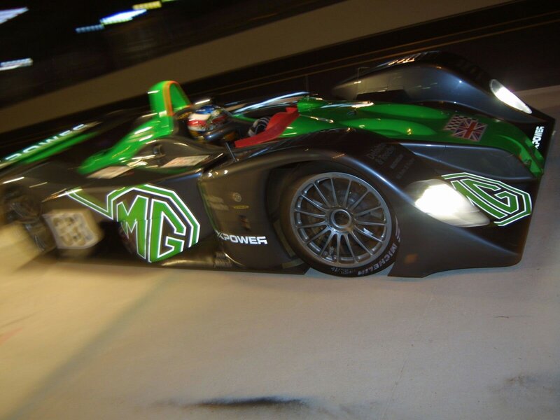 green and black race car
