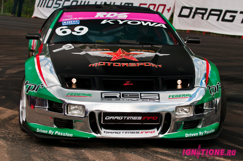 Green and Black Race Car — Competitive