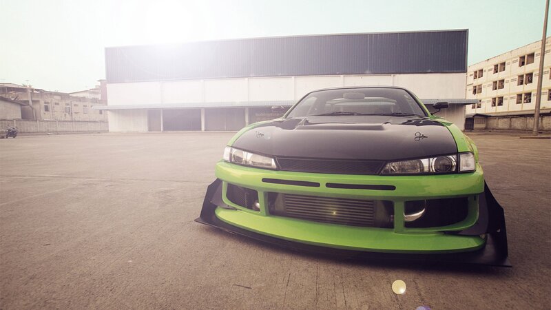 green and black sports car