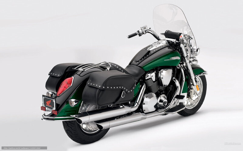 green and black touring motorcycle