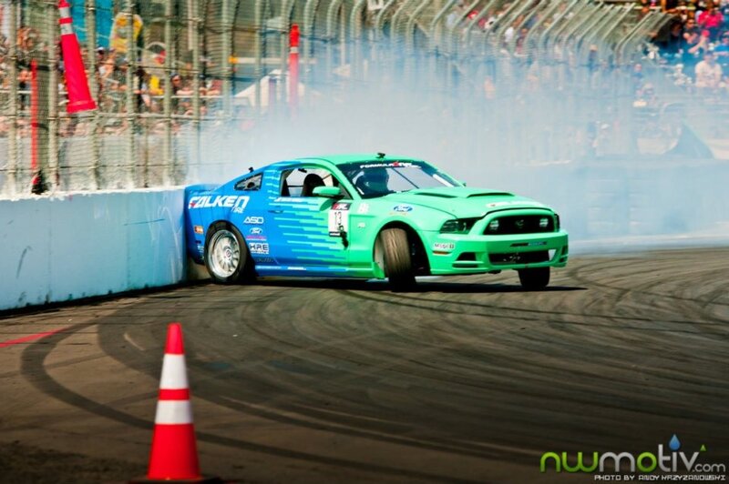 Green and blue drift car on track
