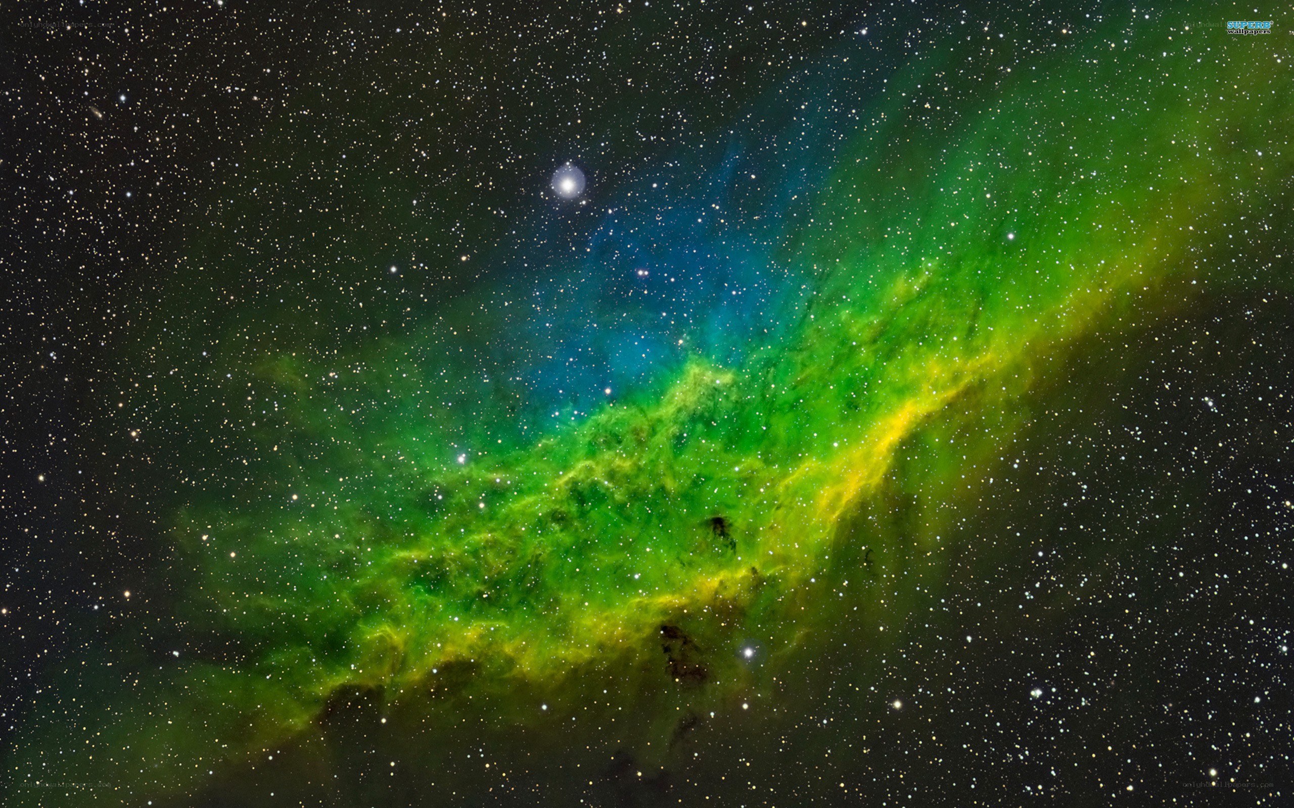 Green and blue nebula in space