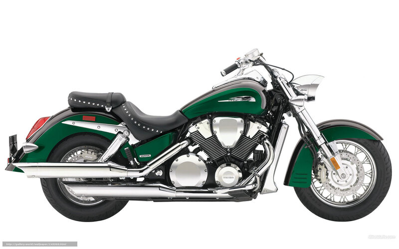 green and chrome motorcycle