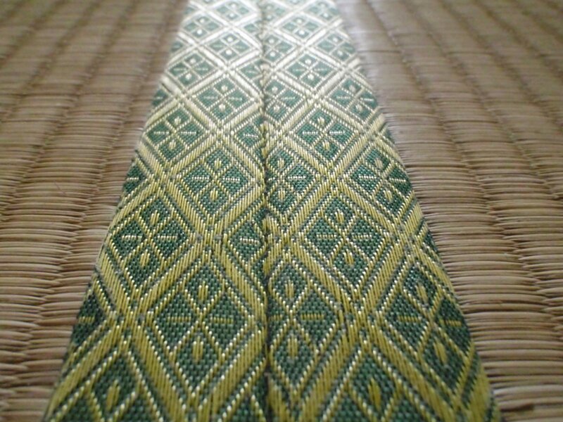 green and gold patterned fabric