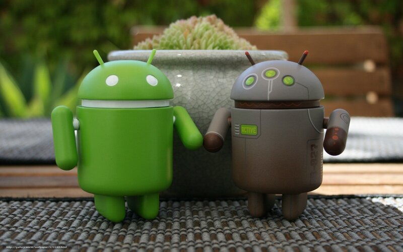 Green and Gray Android Figures