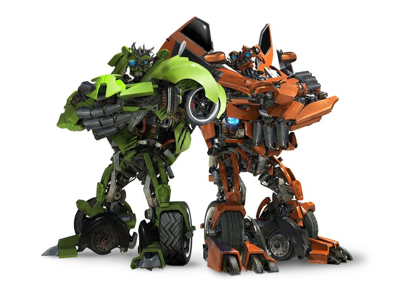 Green and orange robots standing