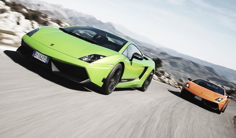 Green and Orange Sports Cars — Dynamic, Afternoon