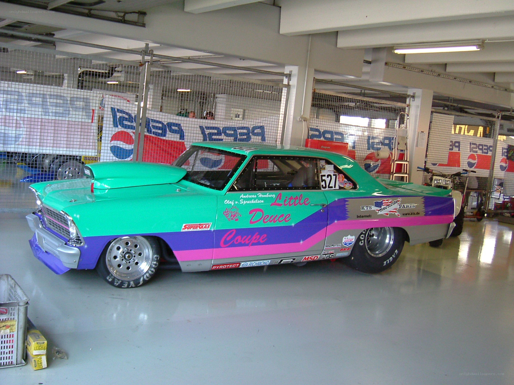 green and purple race car