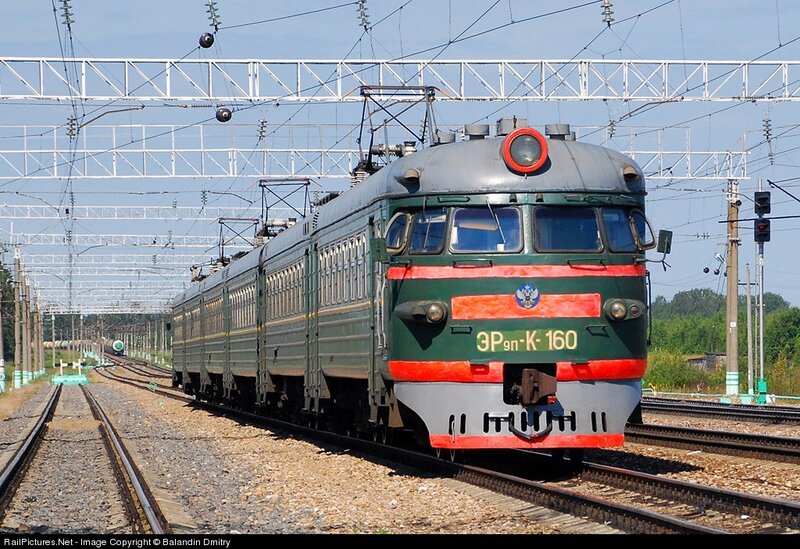 Green and red electric train