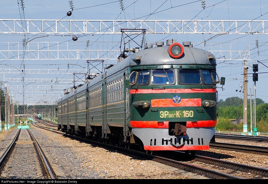 Green and red electric train
