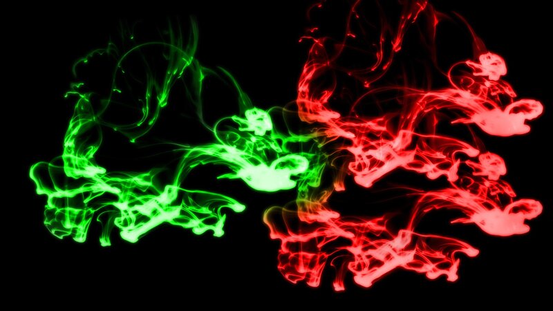 green and red smoke swirls