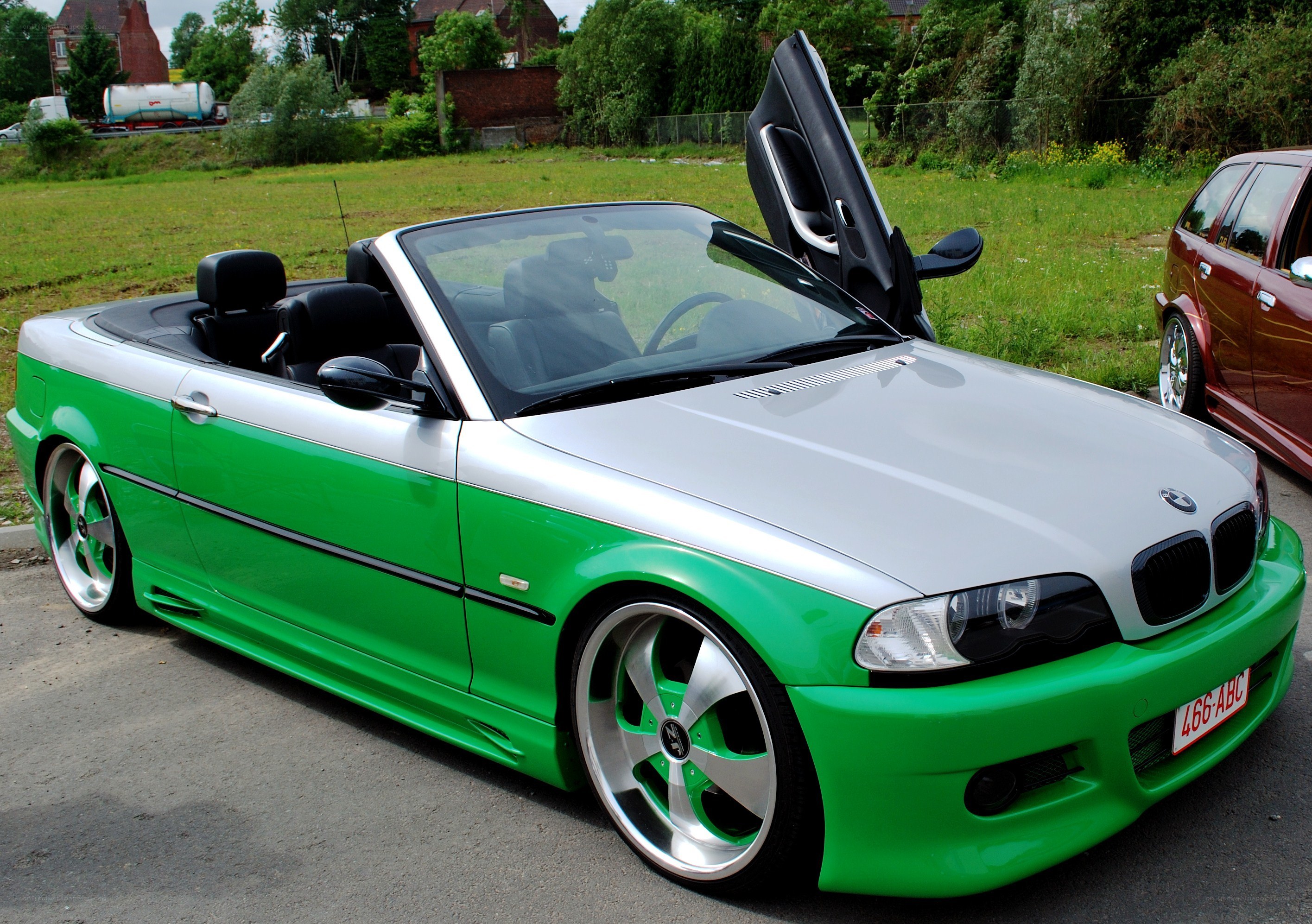 green and silver convertible car