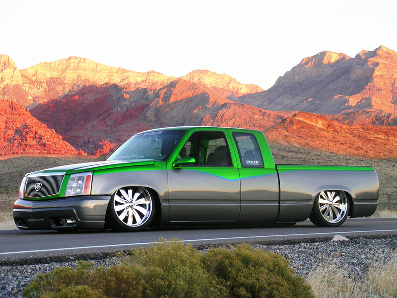 green and silver custom truck
