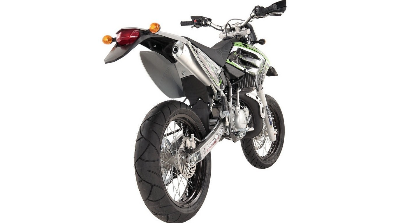 green and silver dirt bike