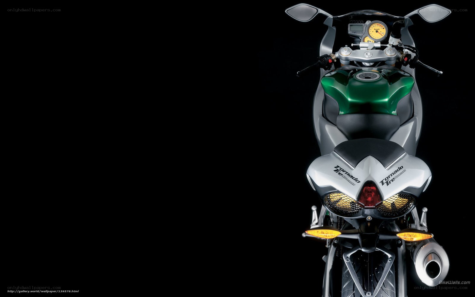 green and silver motorcycle