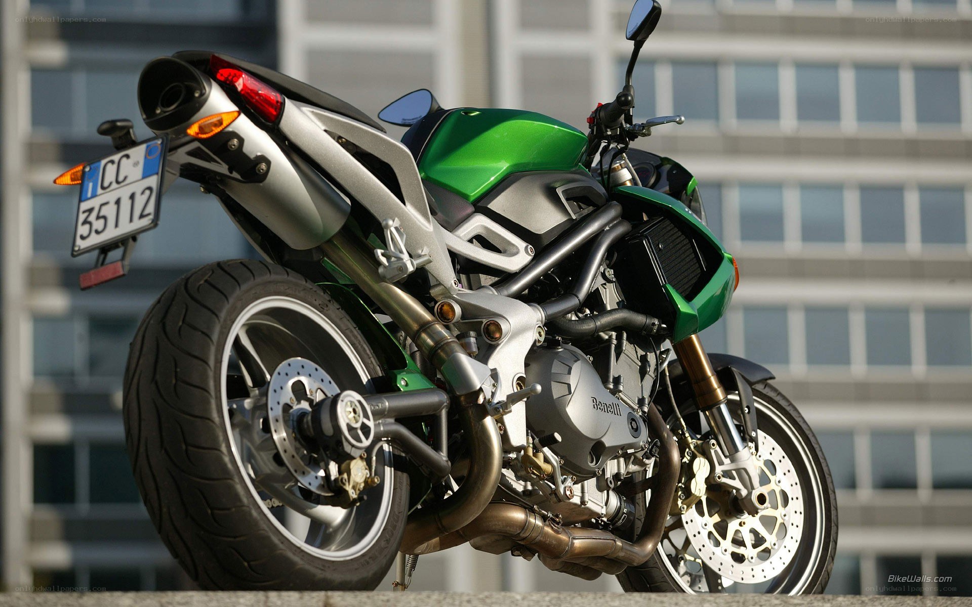 green and silver motorcycle