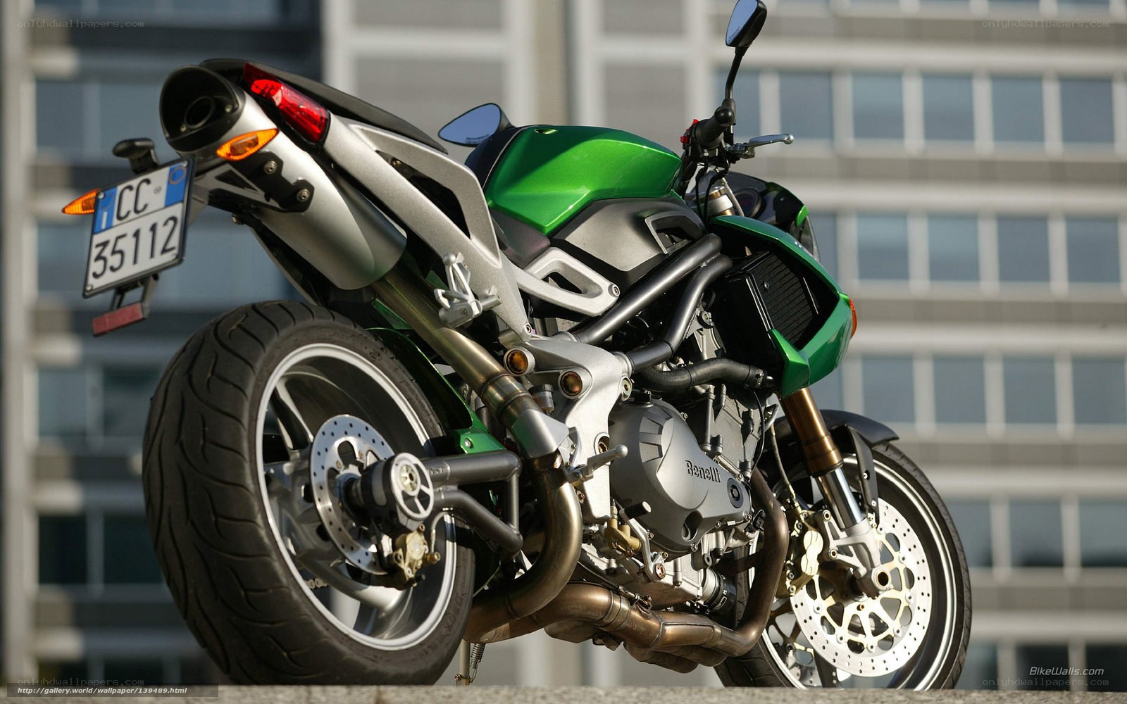 green and silver motorcycle