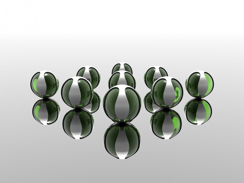 green and silver spheres on reflective surface
