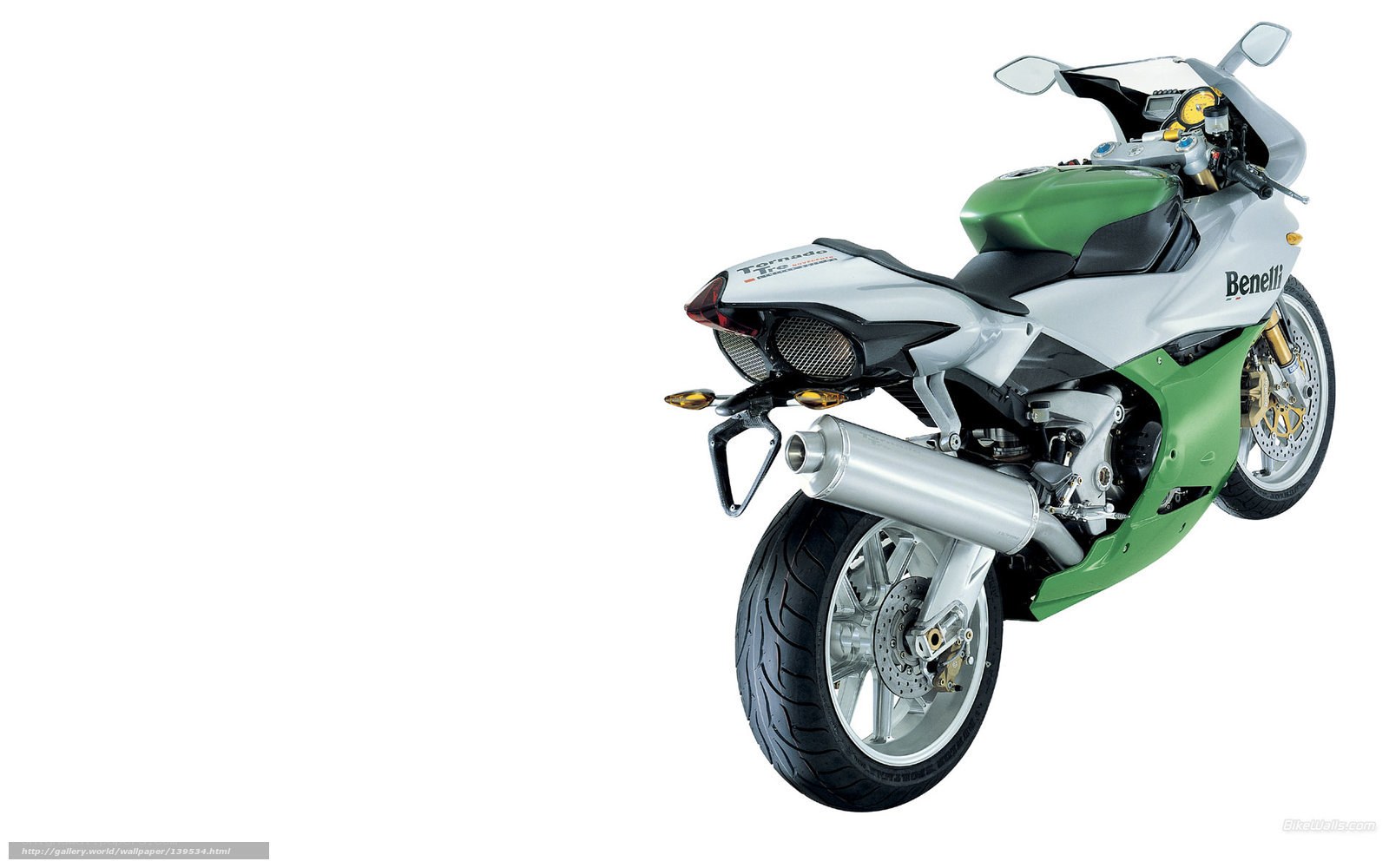 green and silver sport motorcycle