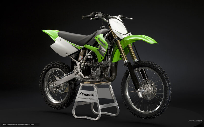 Green and White Dirt Bike — Dramatic, Photograph, Motorcycle Stand, Black Background