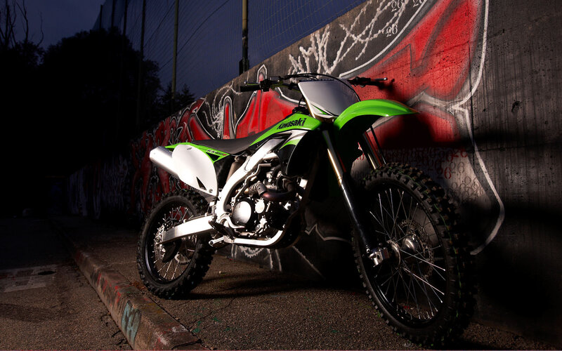 Green and White Dirt Bike — Dramatic