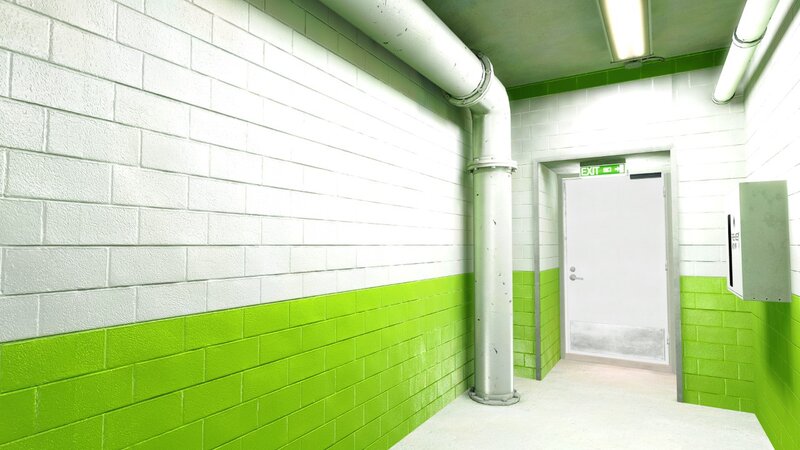 green and white hallway with exit door