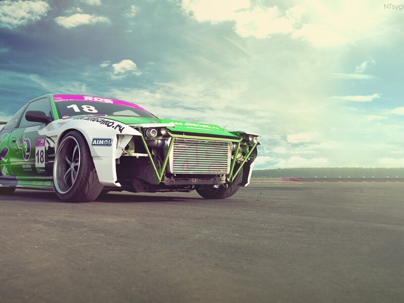 Green and White Race Car — Dramatic, Afternoon, Photograph, Race Track, Sky
