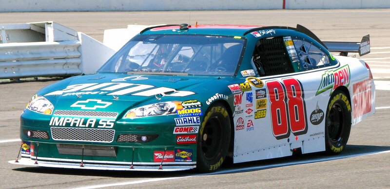 Green and White Race Car — Dynamic, Afternoon, Photograph