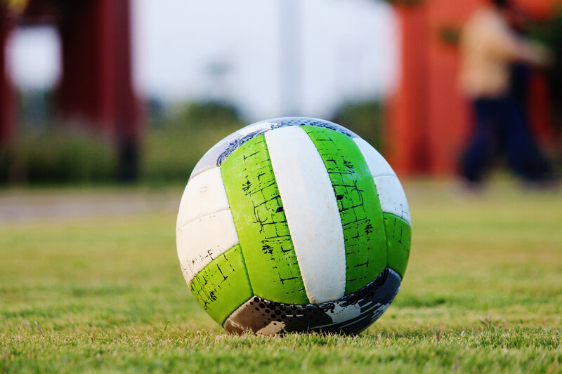 green and white soccer ball