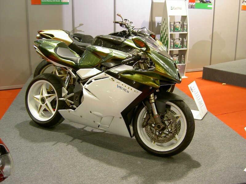 green and white sport motorcycle
