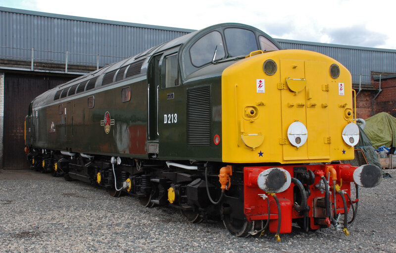 Green and yellow diesel locomotive