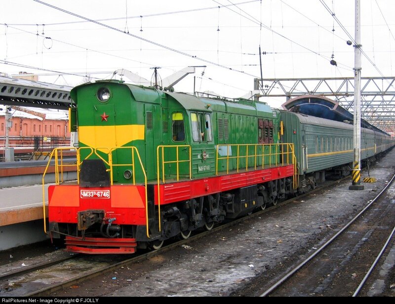 Green and yellow electric locomotive