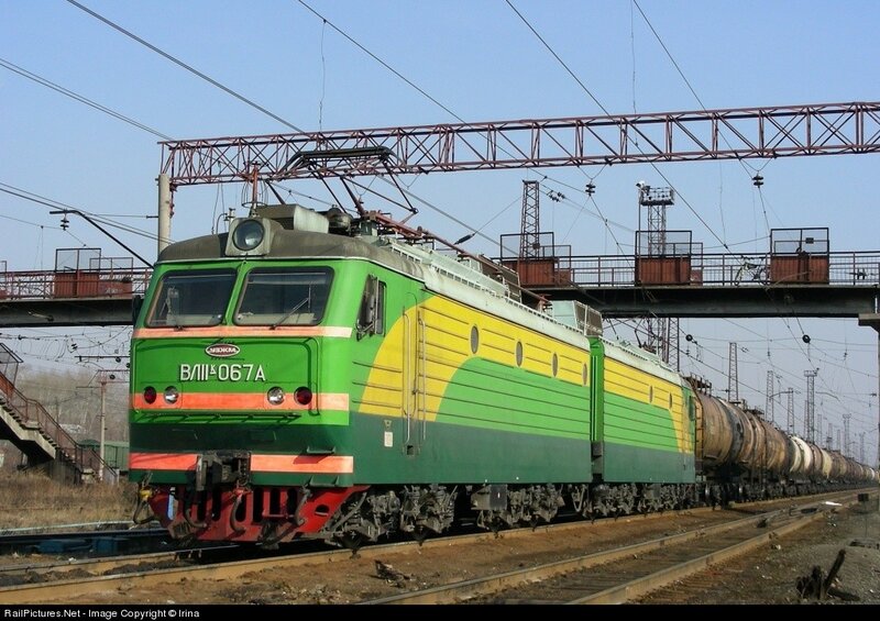 Green and yellow electric locomotive